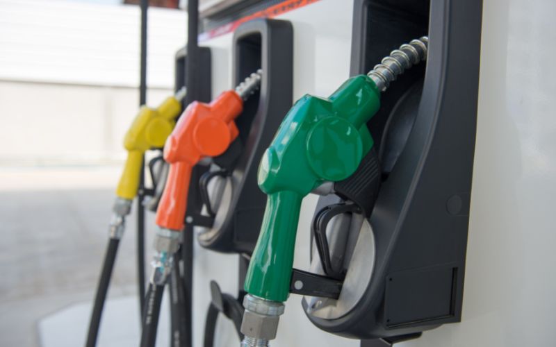 row of colorful gas pumps