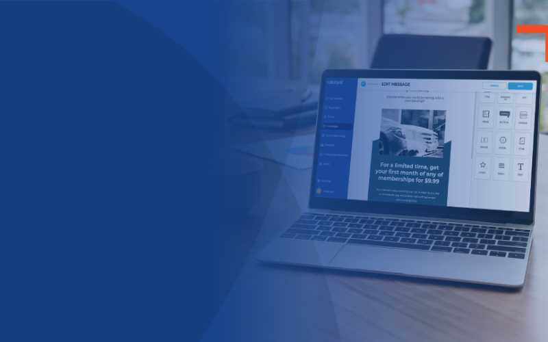 laptop on desk with Catalyst marketing automation platform on screen