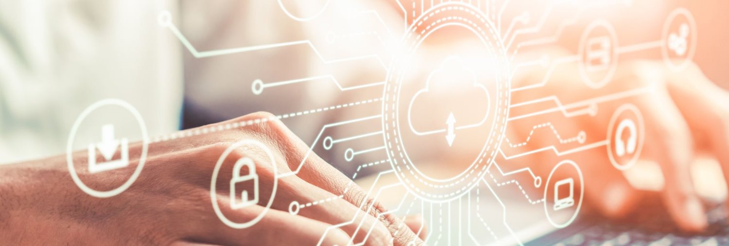 man's hands on a keyboard with computer-related graphics floating over it