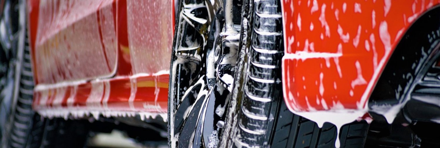Red car with soap suds