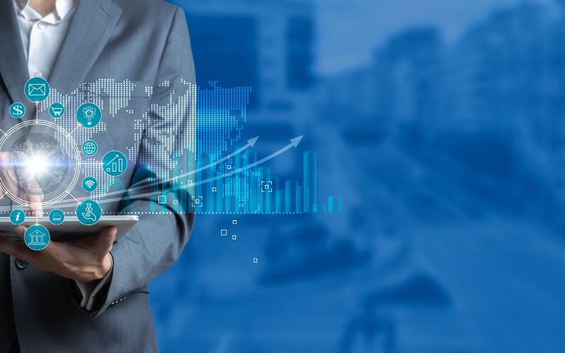 man pointing at data graphic