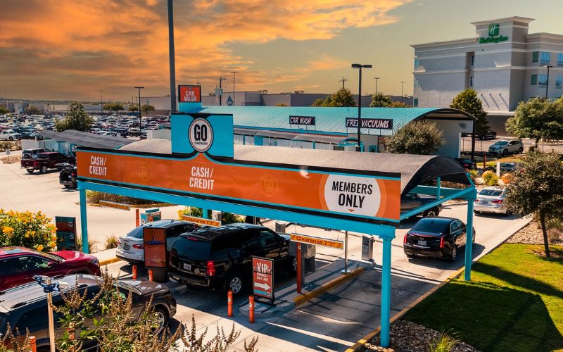 Cars lined up in the lanes at a GO Car Wash location