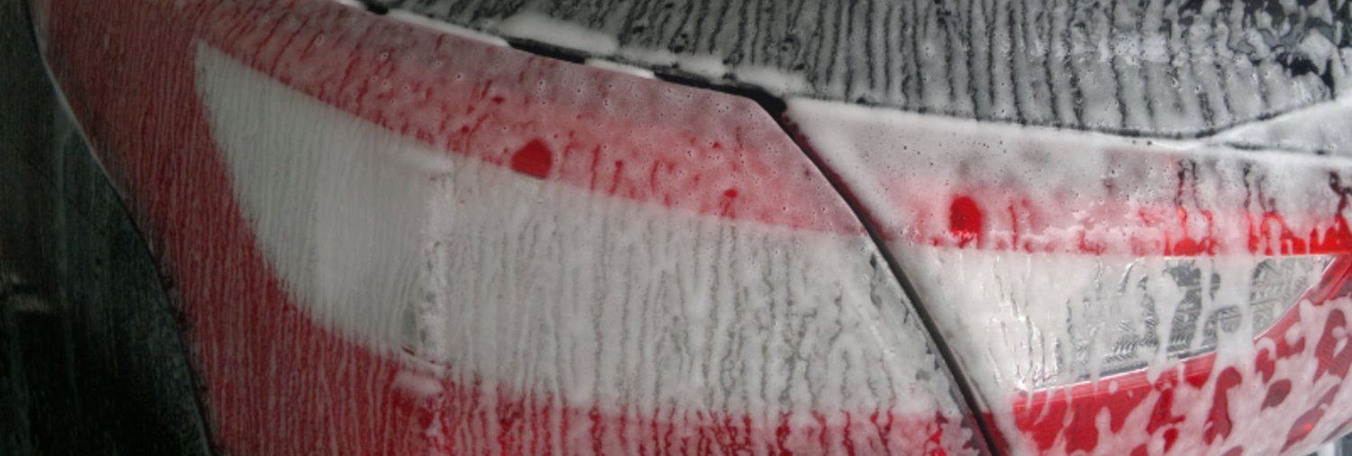 driver side rear taillight with soap from a car wash on it