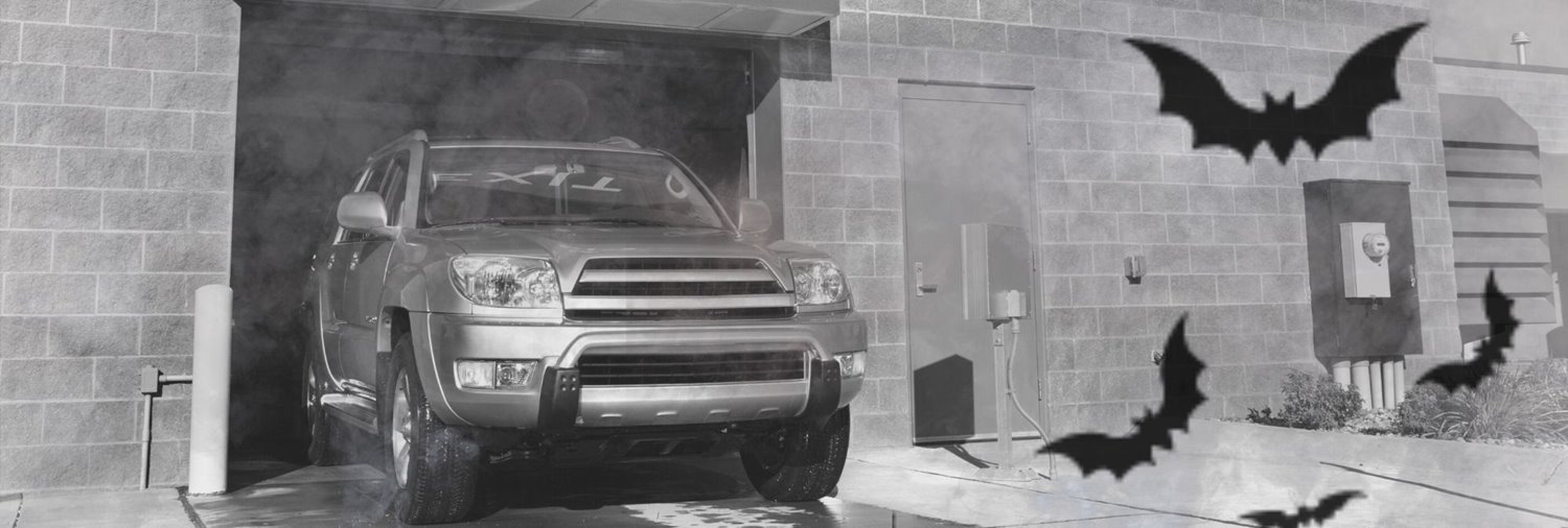 fog and bats in front of a car wash