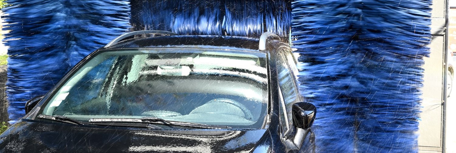 Car getting washed in in-bay