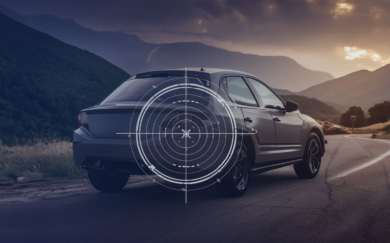 car driving down road with target overlayed on image