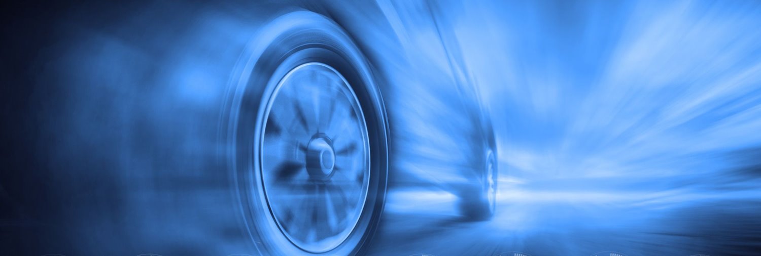 Blurred vehicle in a seemingly forward motion