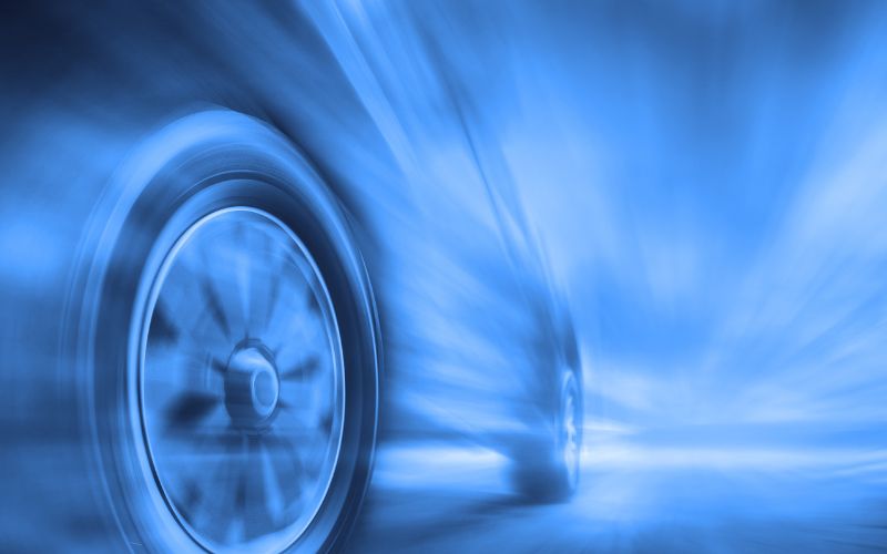 Blurred vehicle in a seemingly forward motion